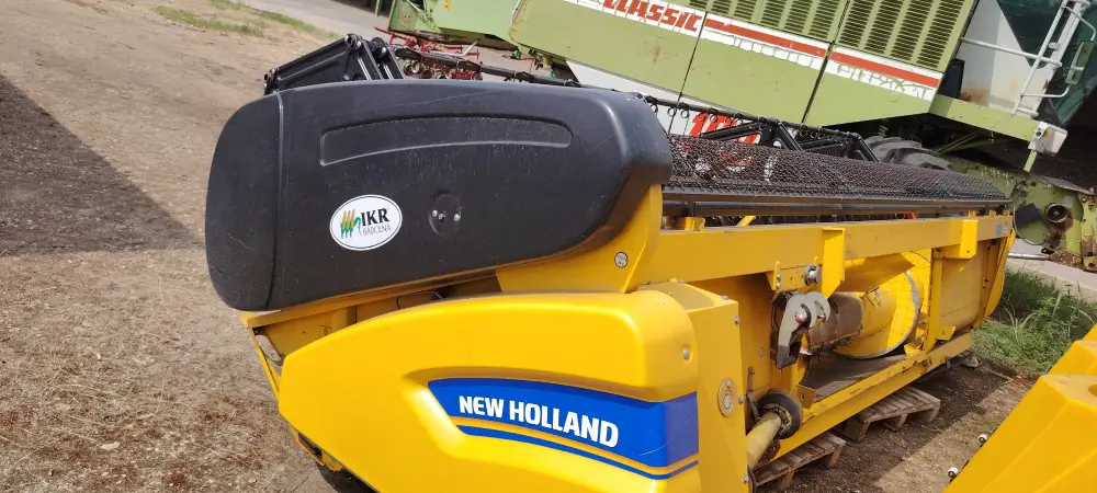 Kombajn NEW HOLLAND TC5070 sa hederom C 450