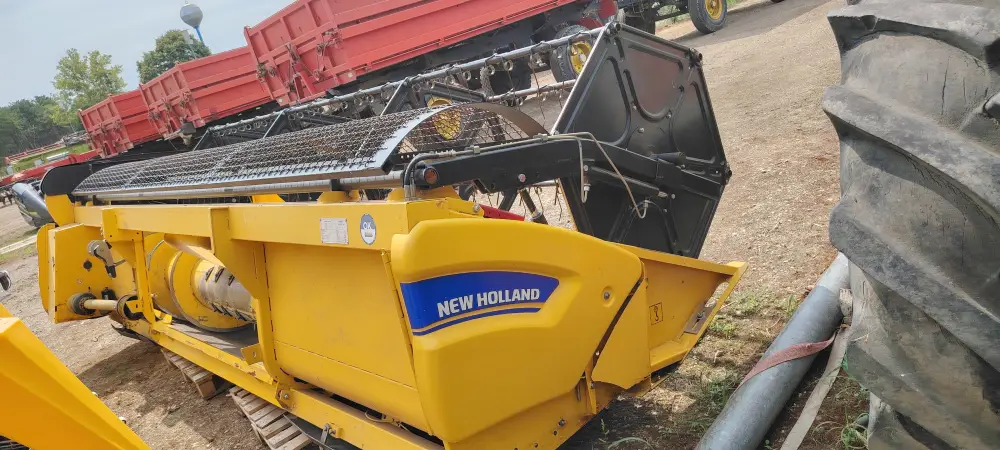 Kombajn NEW HOLLAND TC5070 sa hederom C 450