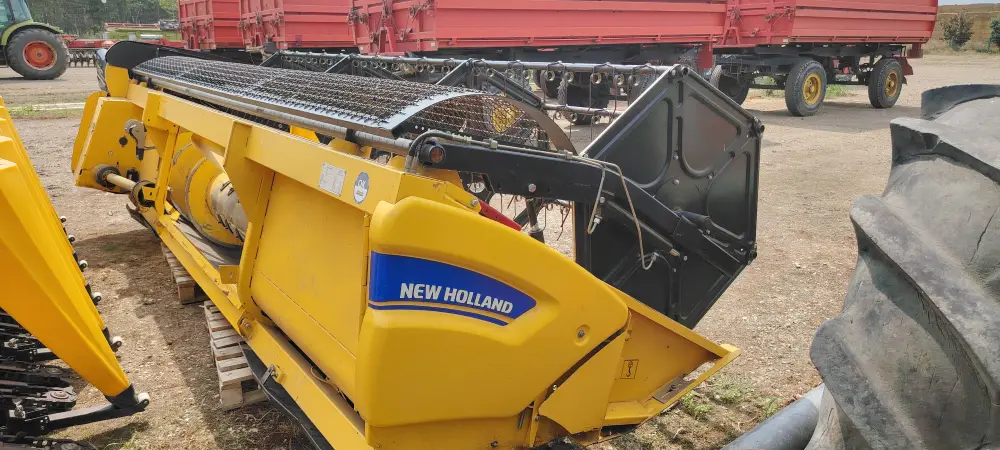 Kombajn NEW HOLLAND TC5070 sa hederom C 450