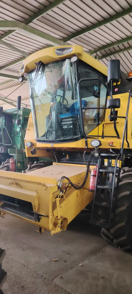 Kombajn NEW HOLLAND TC5070 sa hederom C 450