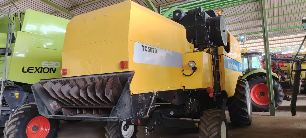 Kombajn NEW HOLLAND TC5070 sa hederom C 450