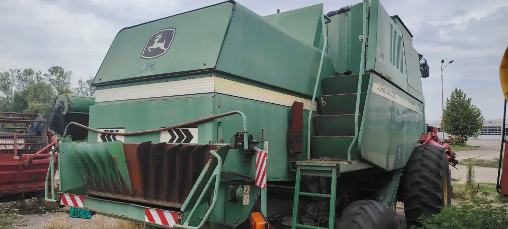 Kombajn JOHN DEERE 1550 sa hederom i kolicima za heder + adapter GHERINGHOFF 6-70 FC