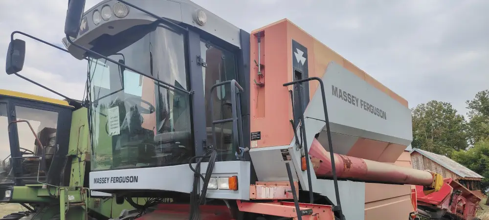 Kombajn MASSEY FERGUSON 7256 sa hederom i kolicima za heder 