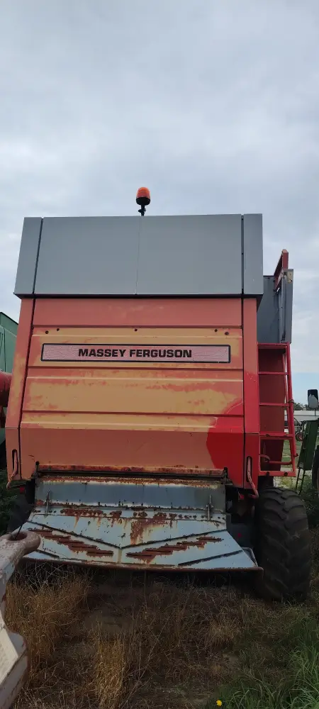 Kombajn MASSEY FERGUSON 7256 sa hederom i kolicima za heder 
