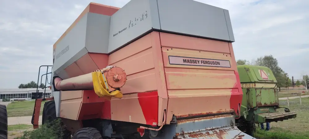 Kombajn MASSEY FERGUSON 7256 sa hederom i kolicima za heder 